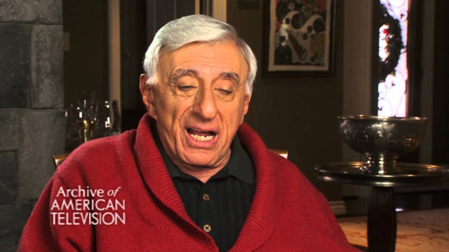 Man red sweater laughing camera free wallpaper for desktop - medium preview image