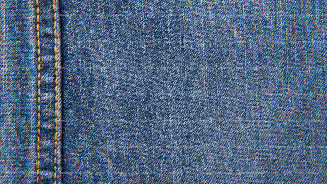 Blue jean stitching macro product free wallpaper for desktop - medium preview image