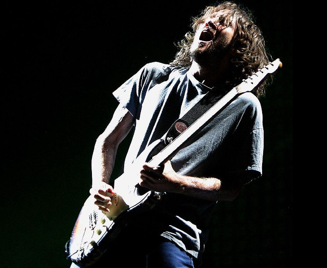 Man guitar microphone performance singer #2 free wallpaper for desktop - medium preview image