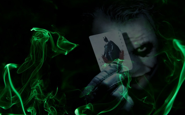 Joker holding card green smoke free wallpaper for desktop - medium preview image