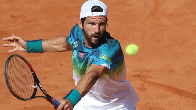 Man swinging tennis racket ball #2 free wallpaper for desktop - medium preview image