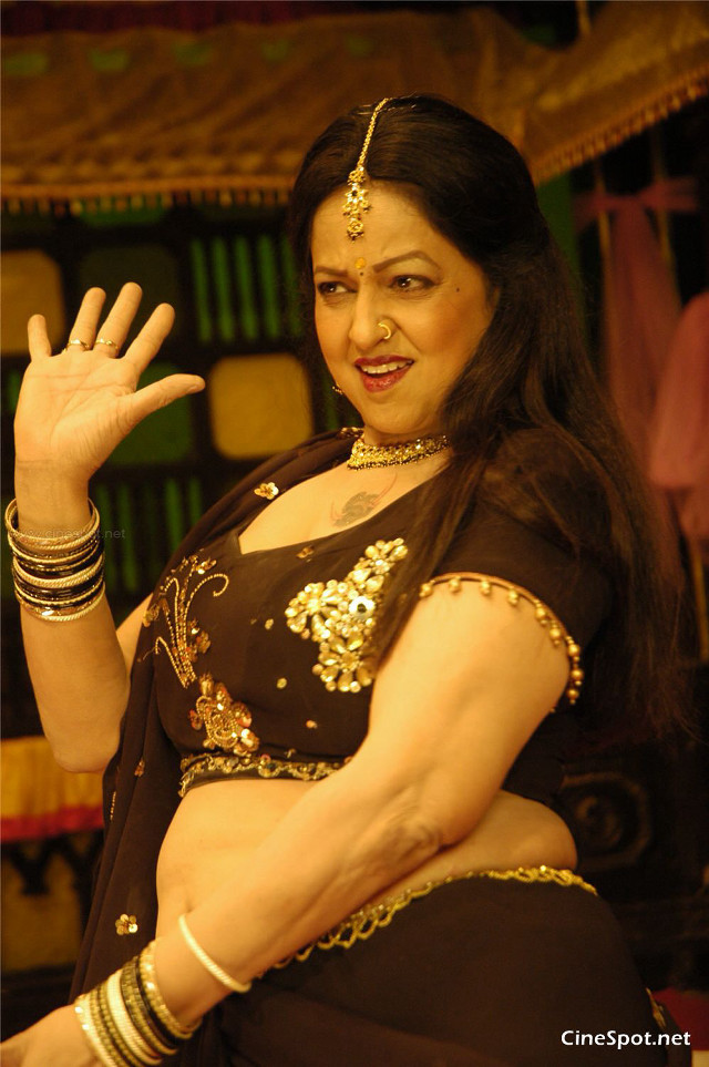 Woman black sari waving hand free wallpaper for mobile - medium preview image