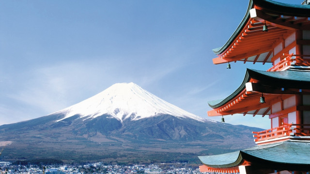 Tall building mountain sky clouds #2 free wallpaper for desktop - medium preview image