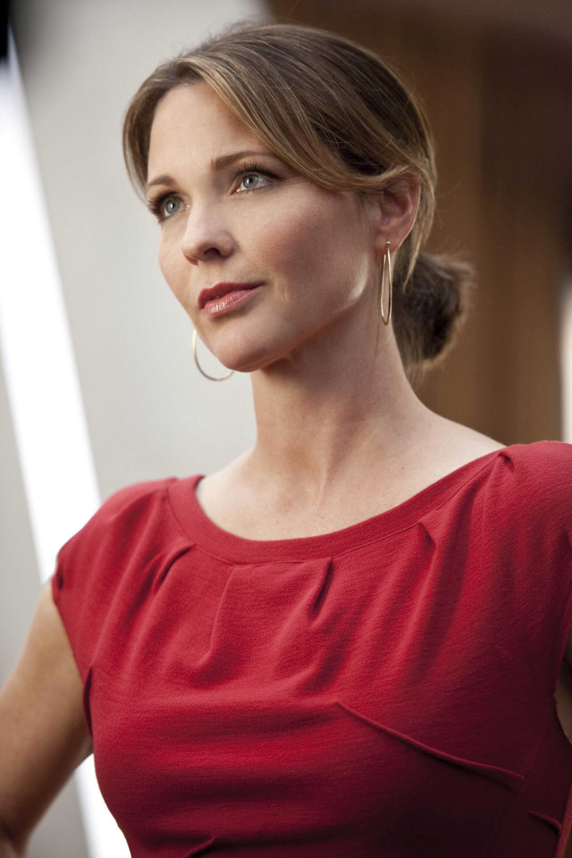 Woman red dress serious look free wallpaper for mobile - medium preview image