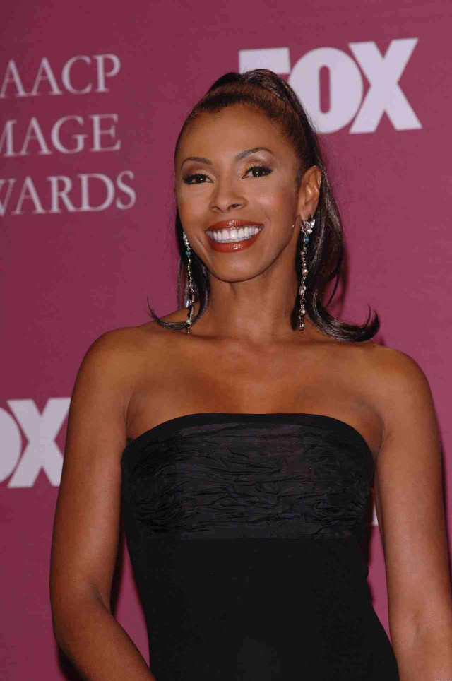 Woman black dress smiling camera #7 free wallpaper for mobile - medium preview image