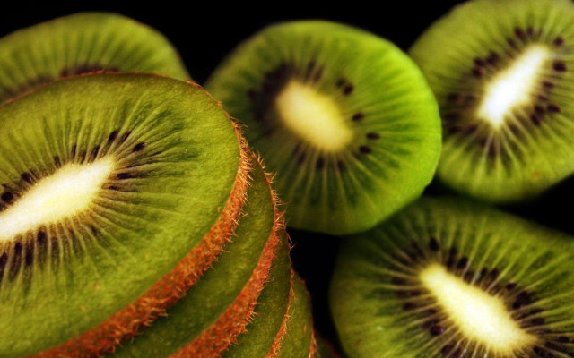 Kiwi fruit sliced closeup stacked free wallpaper for desktop - medium preview image