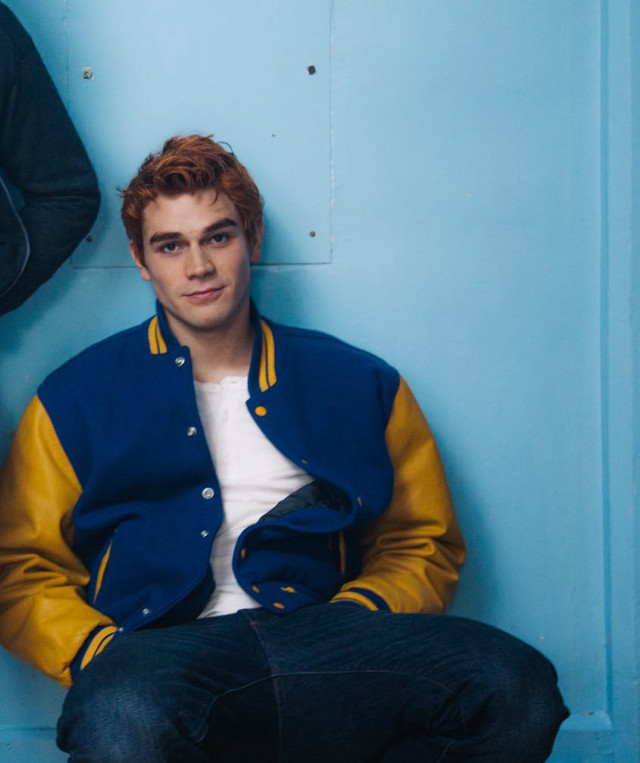 Man sitting blue wall jacket free wallpaper for mobile - medium preview image