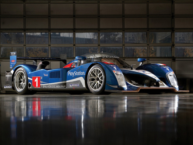 Blue race car building large free wallpaper for desktop - medium preview image