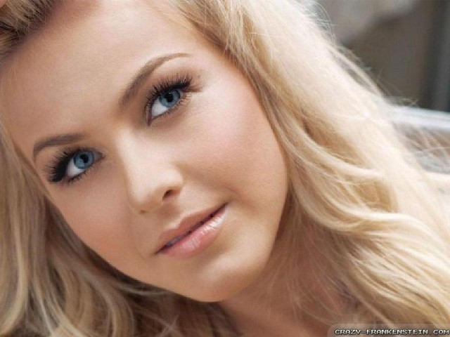 Blonde blueeyed woman posing photorealistic free wallpaper for desktop - medium preview image