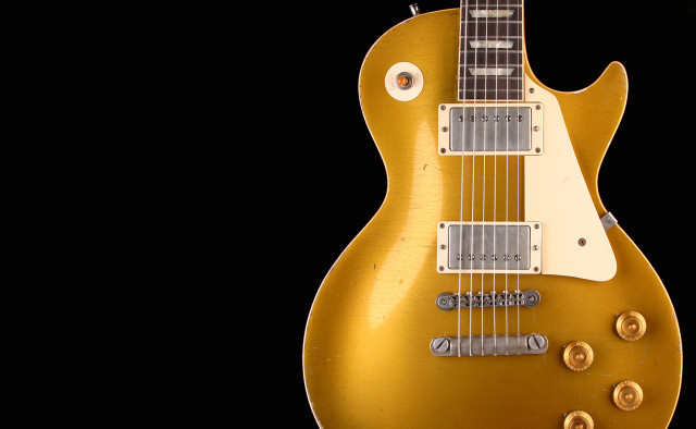 Gold electric guitar black background free wallpaper for desktop - medium preview image