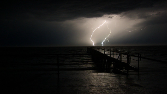 Lightning ocean night pier shockart free wallpaper for desktop - medium preview image
