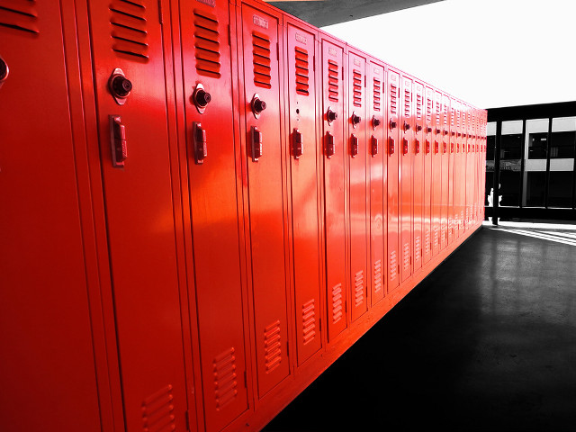 Red lockers person standing background free wallpaper for desktop - medium preview image