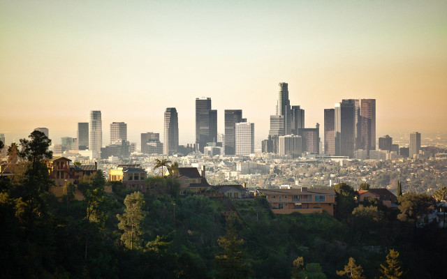 City skyline trees hazy sunset #2 free wallpaper for desktop - medium preview image