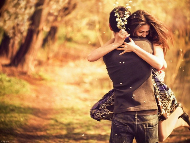 Man woman hug woods holding free wallpaper for desktop - medium preview image