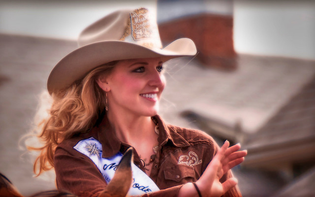 Woman cowboy hat sash neck free wallpaper for desktop - medium preview image