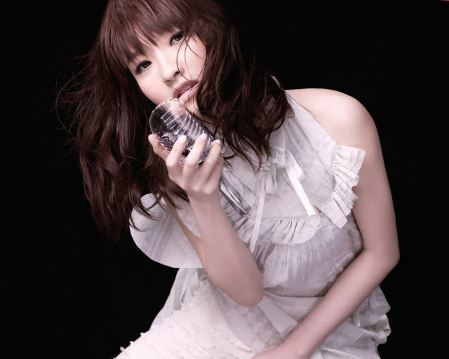 Woman white dress holding water free wallpaper for desktop - medium preview image