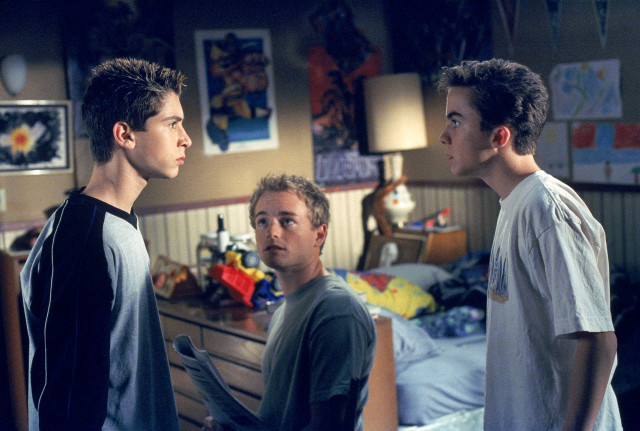 Three young men bedroom bed free wallpaper for desktop - medium preview image