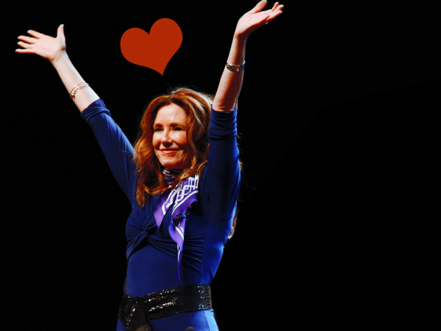 Woman blue top arms up free wallpaper for desktop - medium preview image