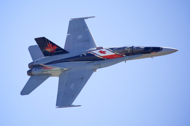 Jet flying blue sky canadian free wallpaper for desktop - medium preview image
