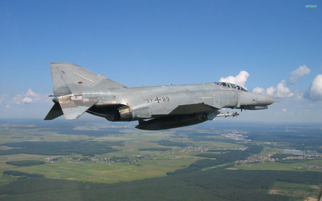 Fighterjet blueSky greenField townDauAlSet puzzleErnst free wallpaper for desktop - medium preview image