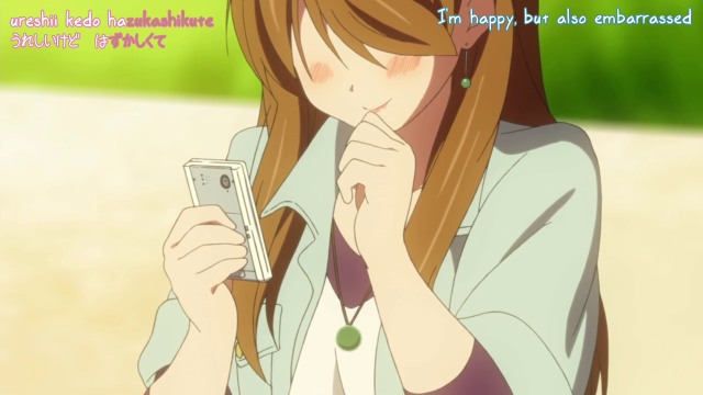 Girl smiling cell phone camera free wallpaper for desktop - medium preview image