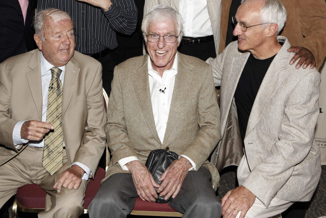 Three men sitting crowd smiling free wallpaper for desktop - medium preview image