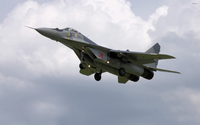 Fighter jet cloudy sky landing #2 free wallpaper for desktop - medium preview image