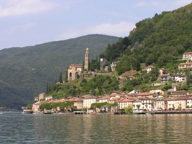 Village hill water clocktower mountain free wallpaper for desktop - medium preview image