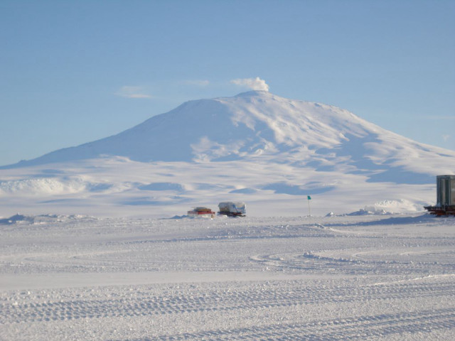 Snowy field mountain truck tracks free wallpaper for desktop - medium preview image