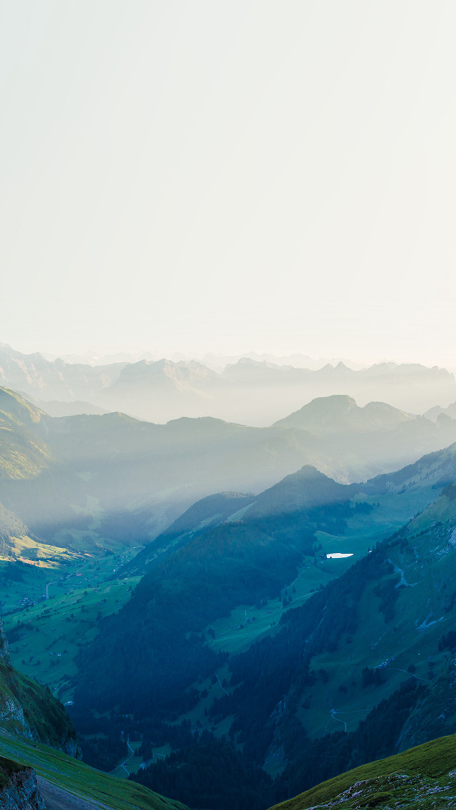 Man riding horse green hillside free wallpaper for mobile - medium preview image