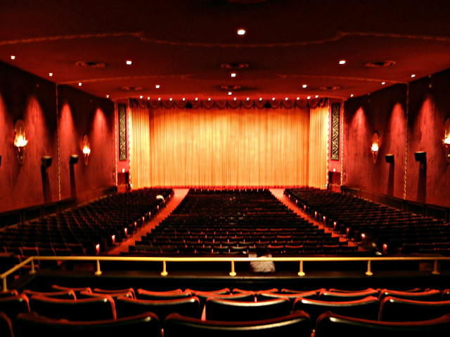 Theater seats curtained wall stage free wallpaper for desktop - medium preview image