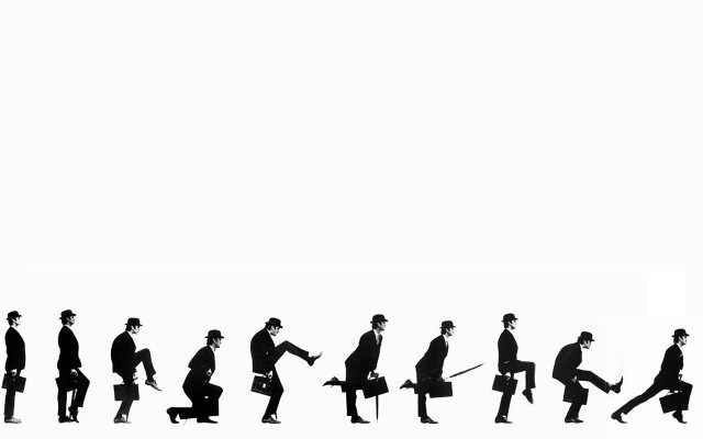 Silhouette group people walking umbrellas free wallpaper for desktop - medium preview image