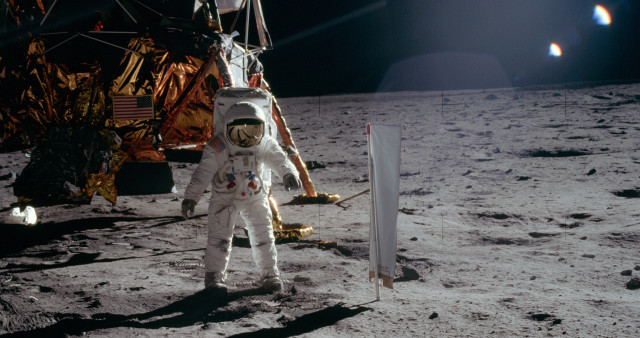 Man white astronaut suit moon free wallpaper for desktop - medium preview image