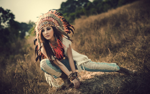 Woman headdress kneeling field grass free wallpaper for desktop - medium preview image