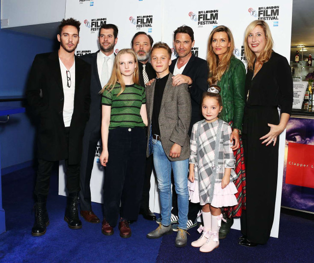 Group people blue carpet white free wallpaper for desktop - medium preview image