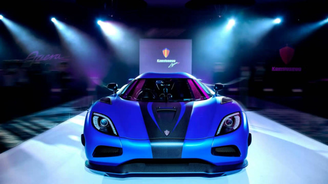 Blue sports car showroom display #2 free wallpaper for desktop - medium preview image