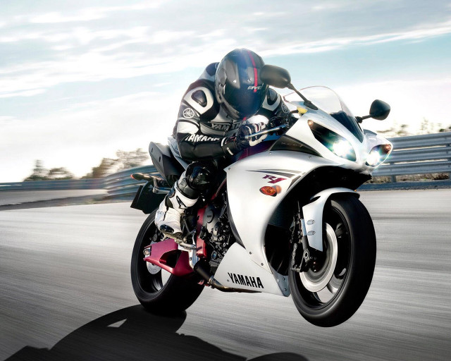 Motorcycle rider track sky clouds free wallpaper for desktop - medium preview image