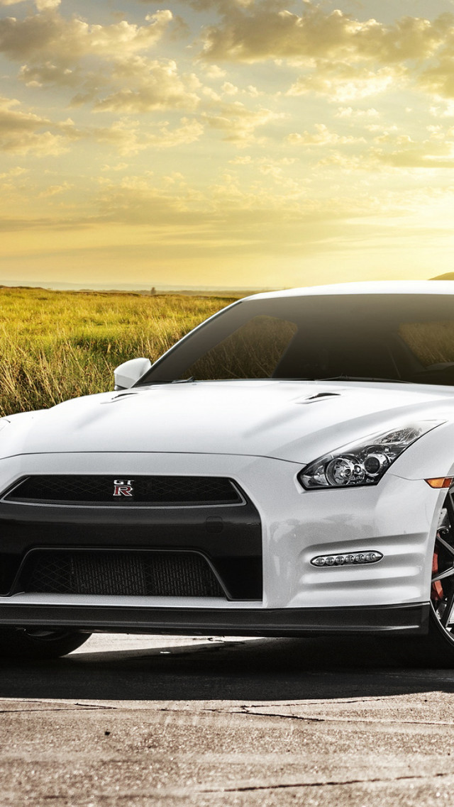 White car parked road grass free wallpaper for mobile - medium preview image