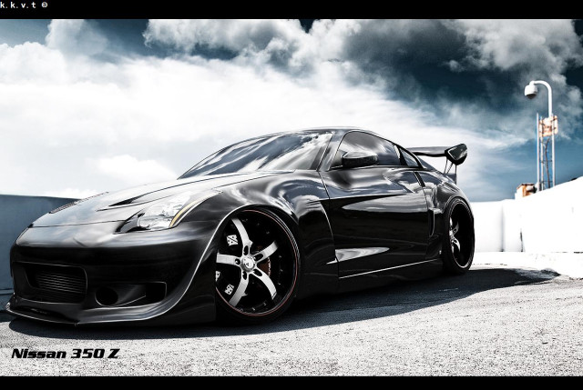 Black sports car cloudy sky #12 free wallpaper for desktop - medium preview image