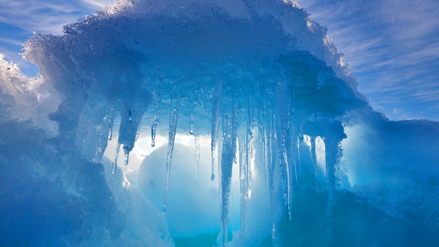 Ice cave icicles blue sky free wallpaper for desktop - medium preview image