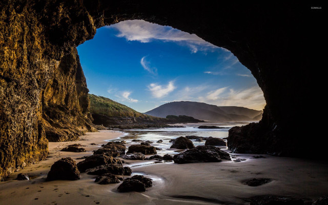Cave beach mountains sunset blue free wallpaper for desktop - medium preview image