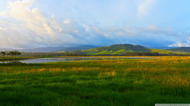 Field lake mountains clouds sky free wallpaper for desktop - medium preview image