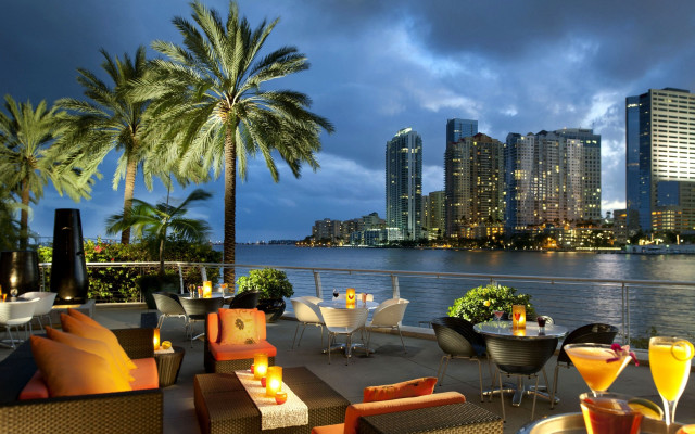 Cityscape night palmtrees restaurant tables free wallpaper for desktop - medium preview image
