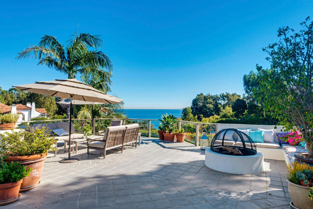 Patio firepit ocean view trees free wallpaper for desktop - medium preview image