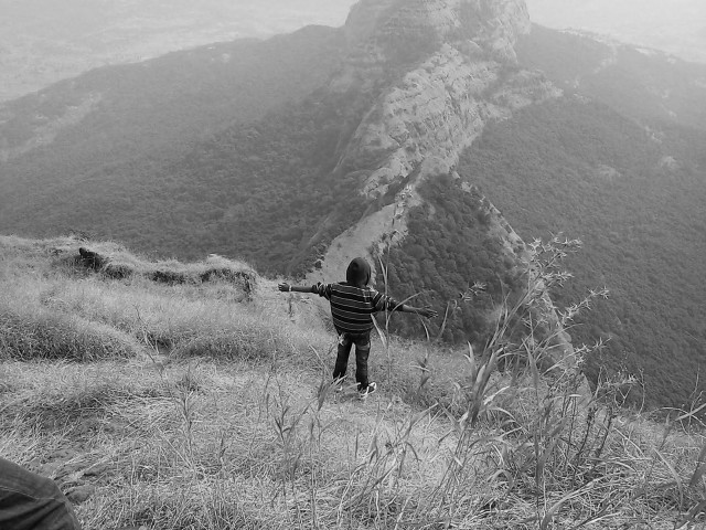 Person standing hill arms outstretched free wallpaper for desktop - medium preview image