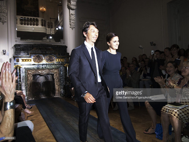 Man woman walking runway crowd free wallpaper for desktop - medium preview image