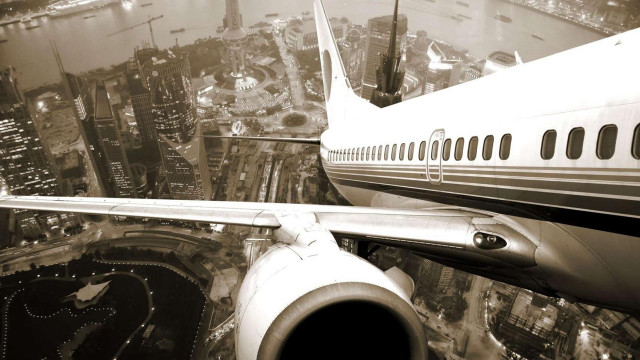 Jetliner night city lights tunnel free wallpaper for desktop - medium preview image