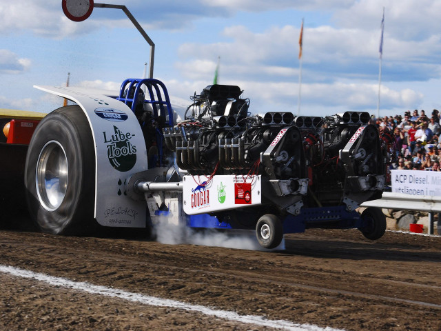 Tractor trailer large tire crowd free wallpaper for desktop - medium preview image