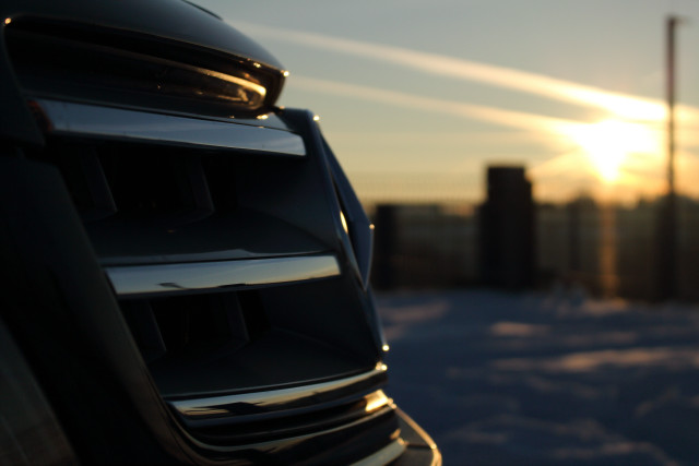 Car parked snow sunset building free wallpaper for desktop - medium preview image