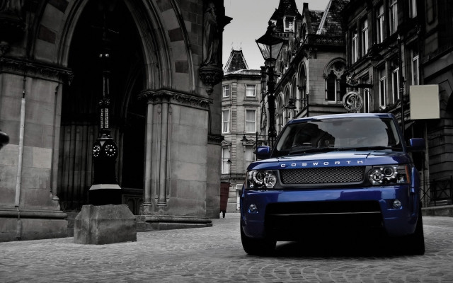 Blue land rover cobblestone street free wallpaper for desktop - medium preview image